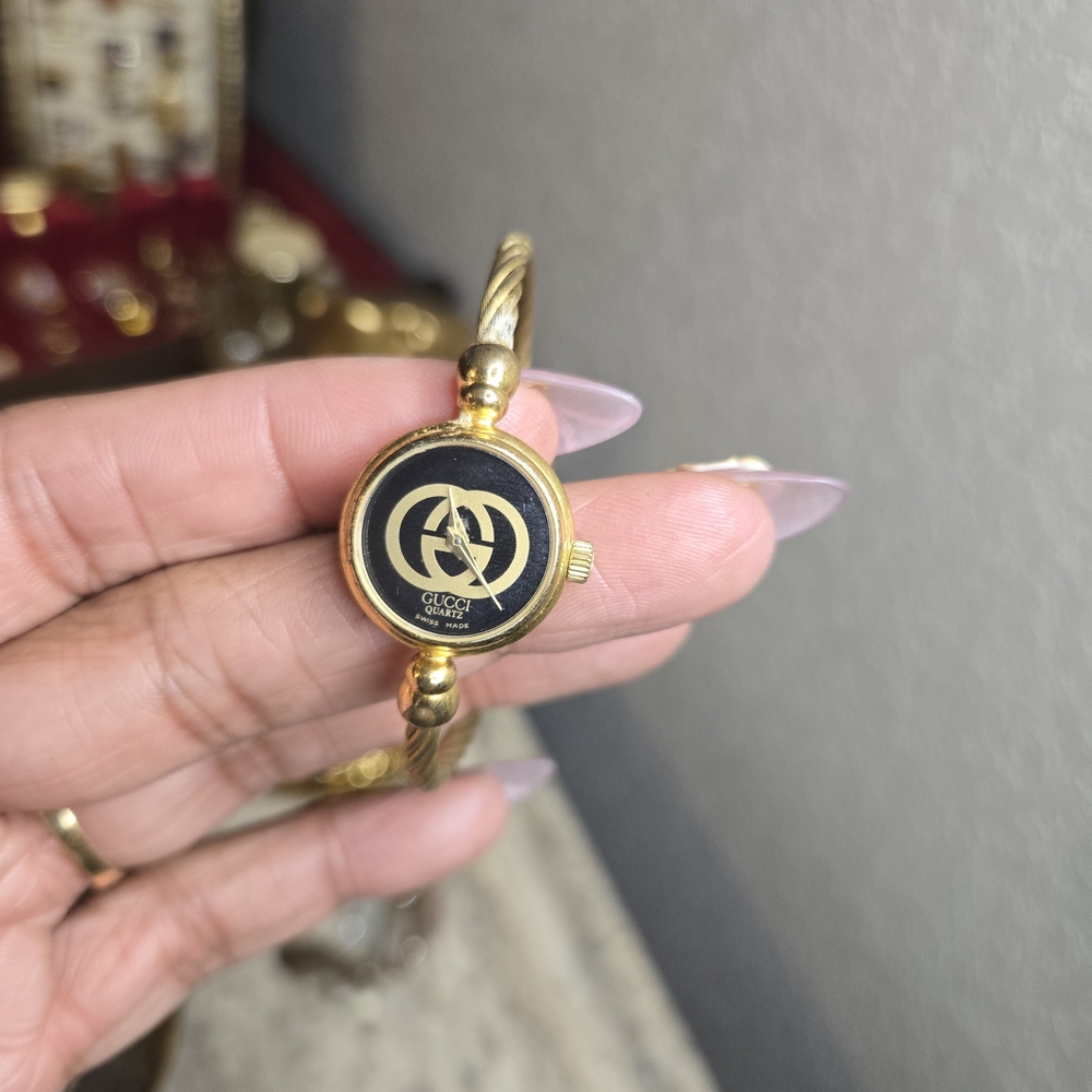 Gucci Gold-Tone Cable Bangle Watch with Black Dial